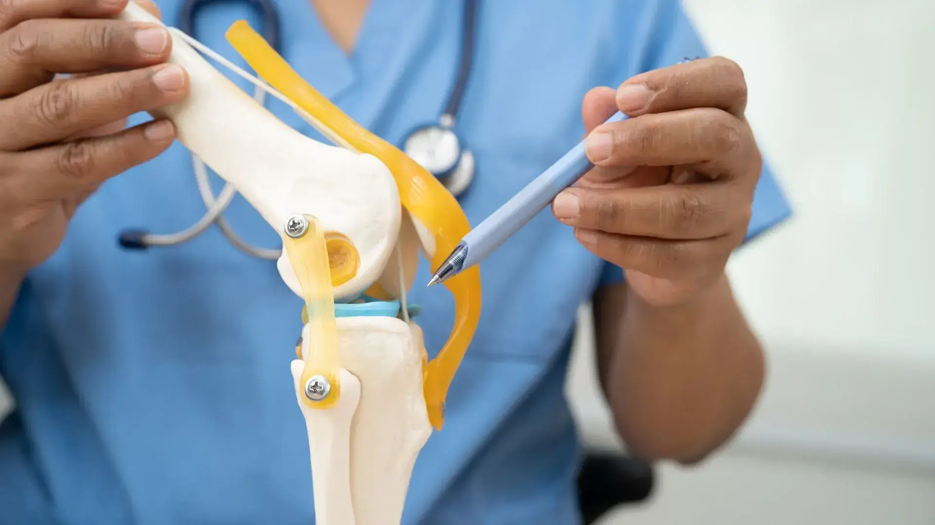 Medical professional examining patient at Physio Cure Point physiotherapy clinic in Surathkal